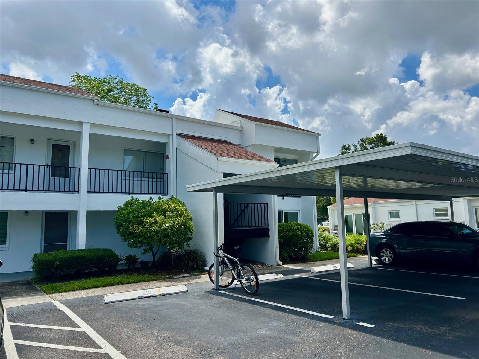 Front Exterior With Assigned Parking Just Out Your Front Door