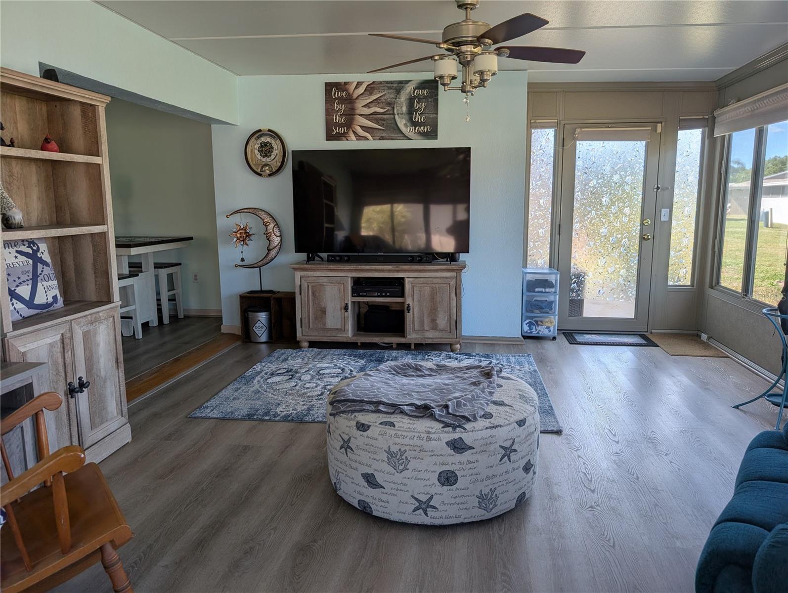 View thru Florida room to back patio door.