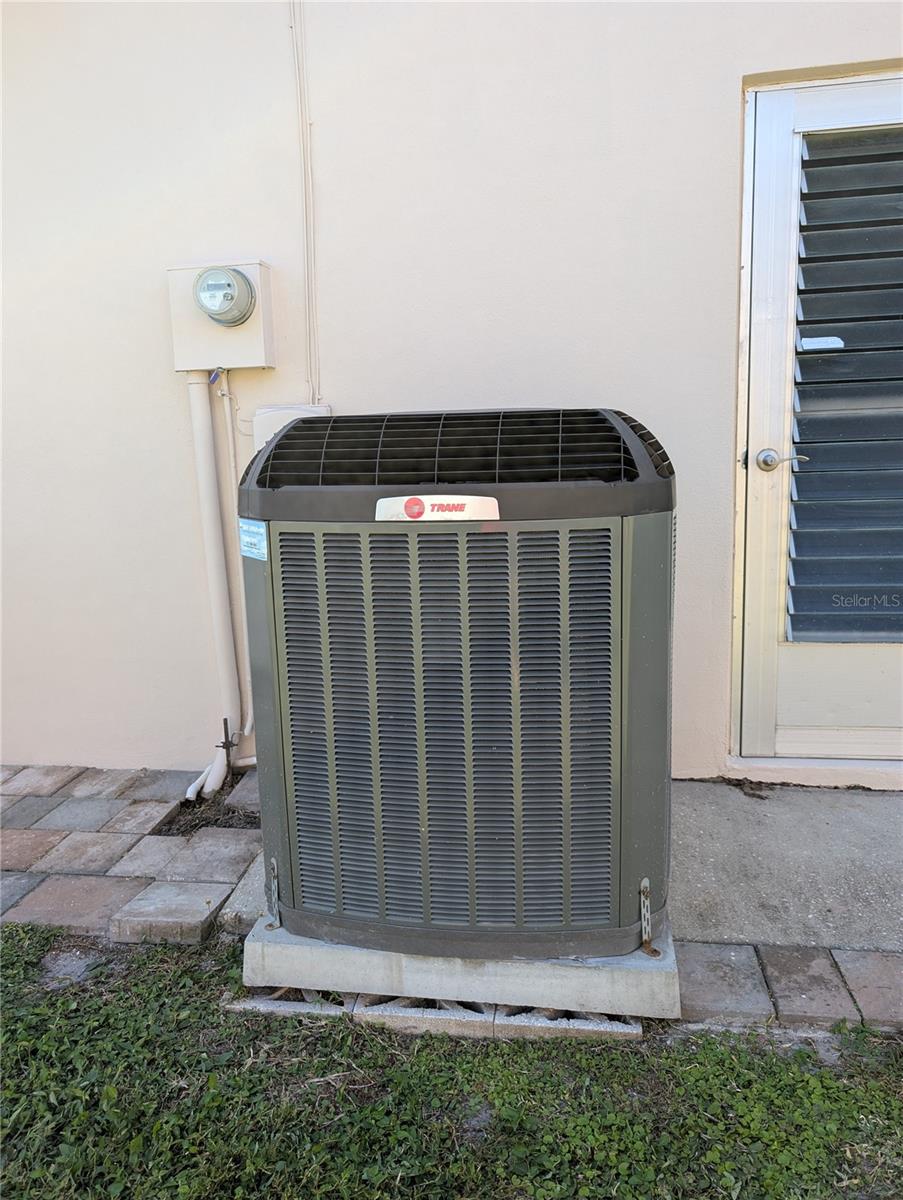 Trane 2.5 ton, 5 kw heat pump, 17 seer HVAC system.