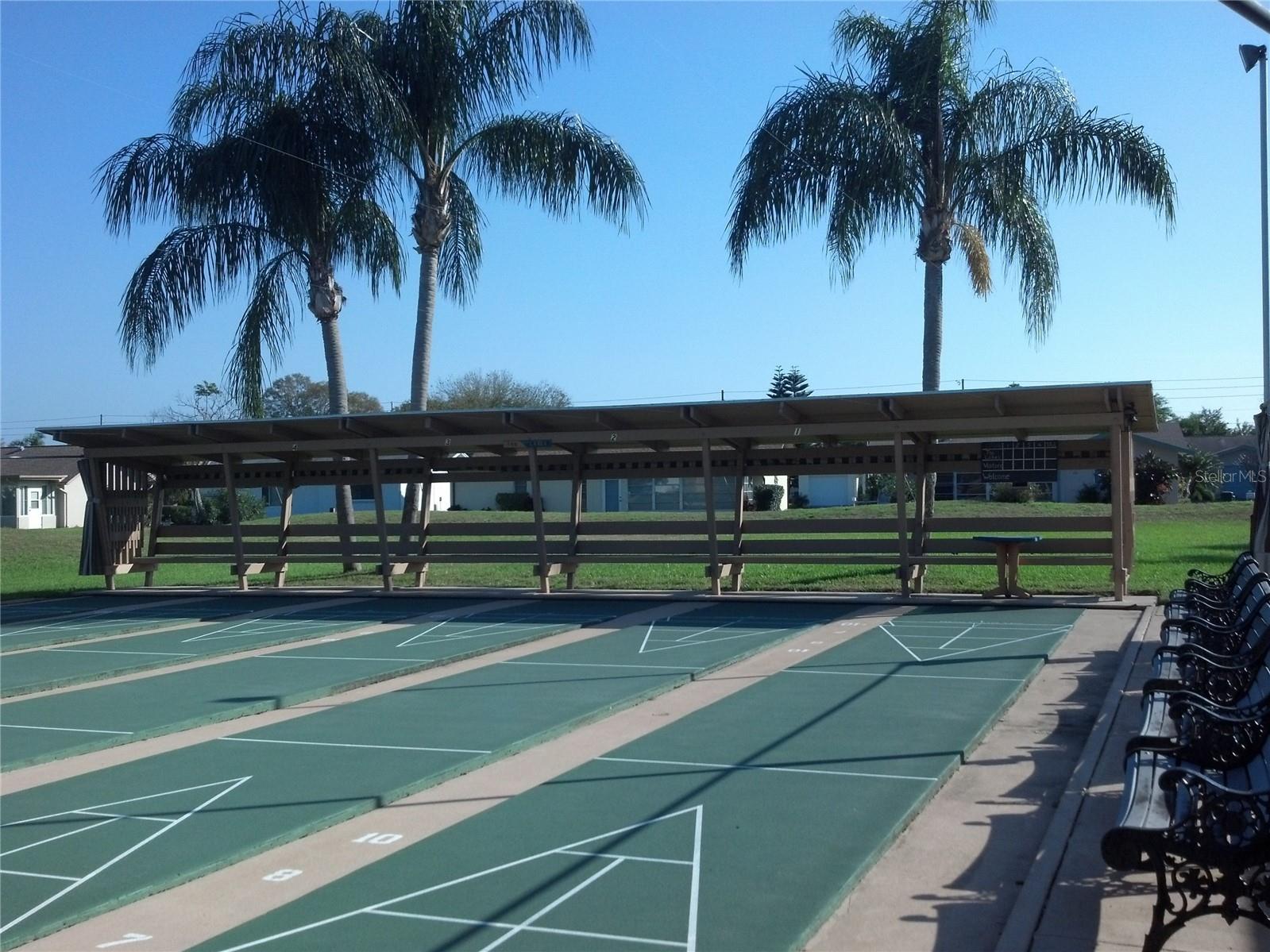 Covered or bench seating for players or audience.