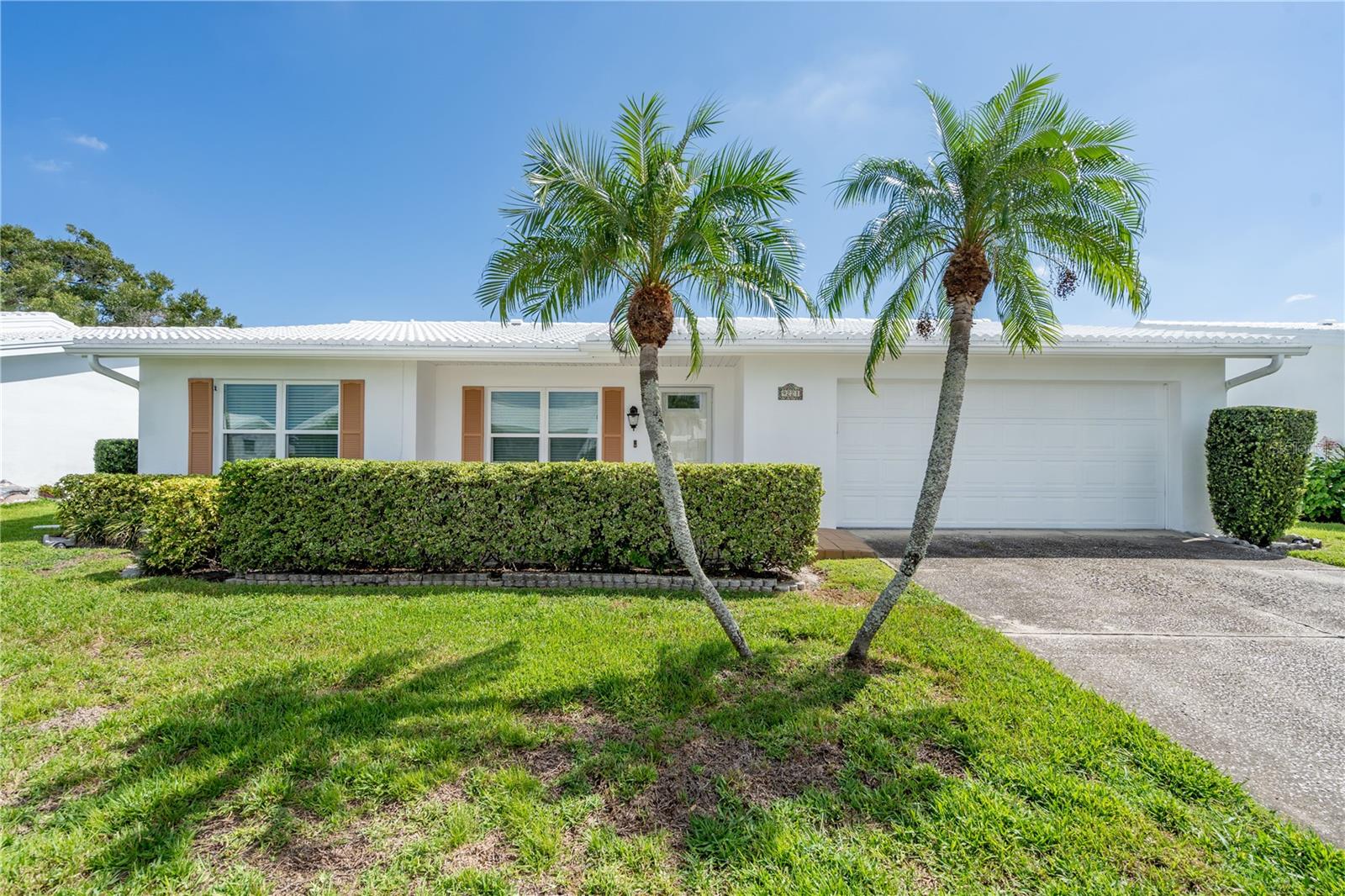 9221 40th Way N.  They cut the grass for you!