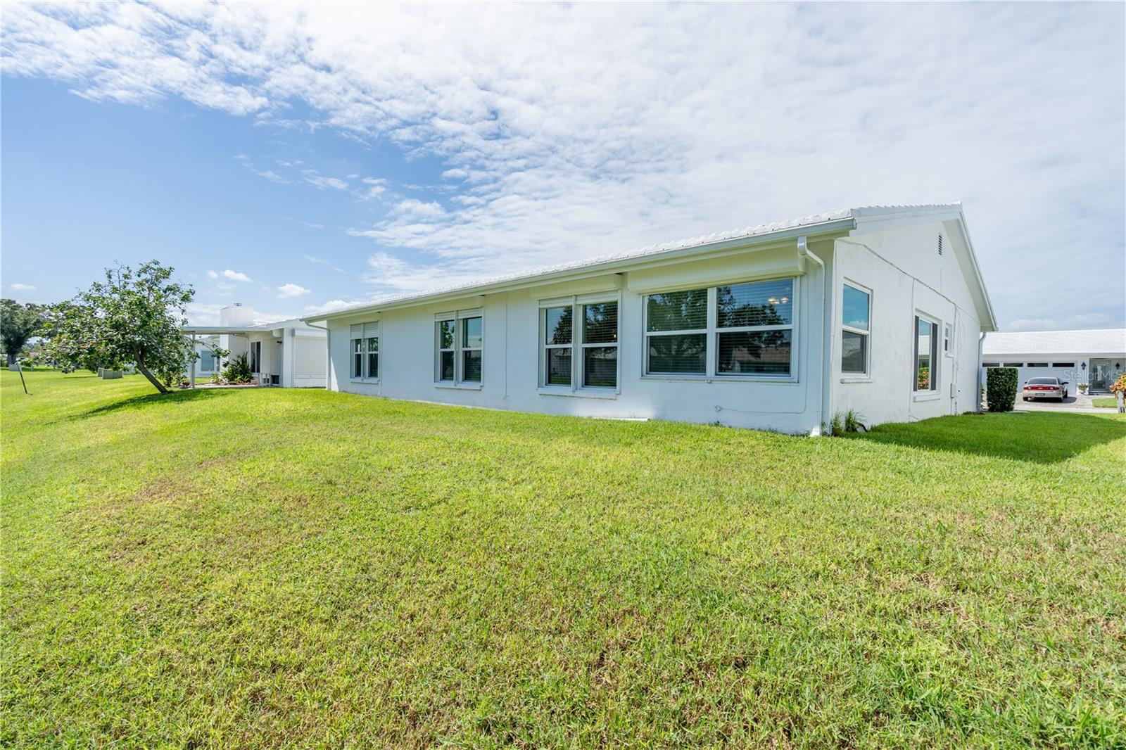 Rear, All hurricane rated impact windows