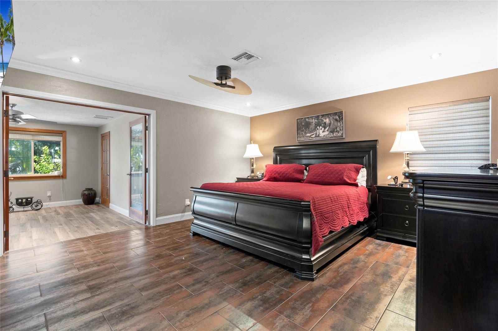 PRIMARY BEDROOM ACCESS DIRECTLY TO POOL AND OFFICE AREA