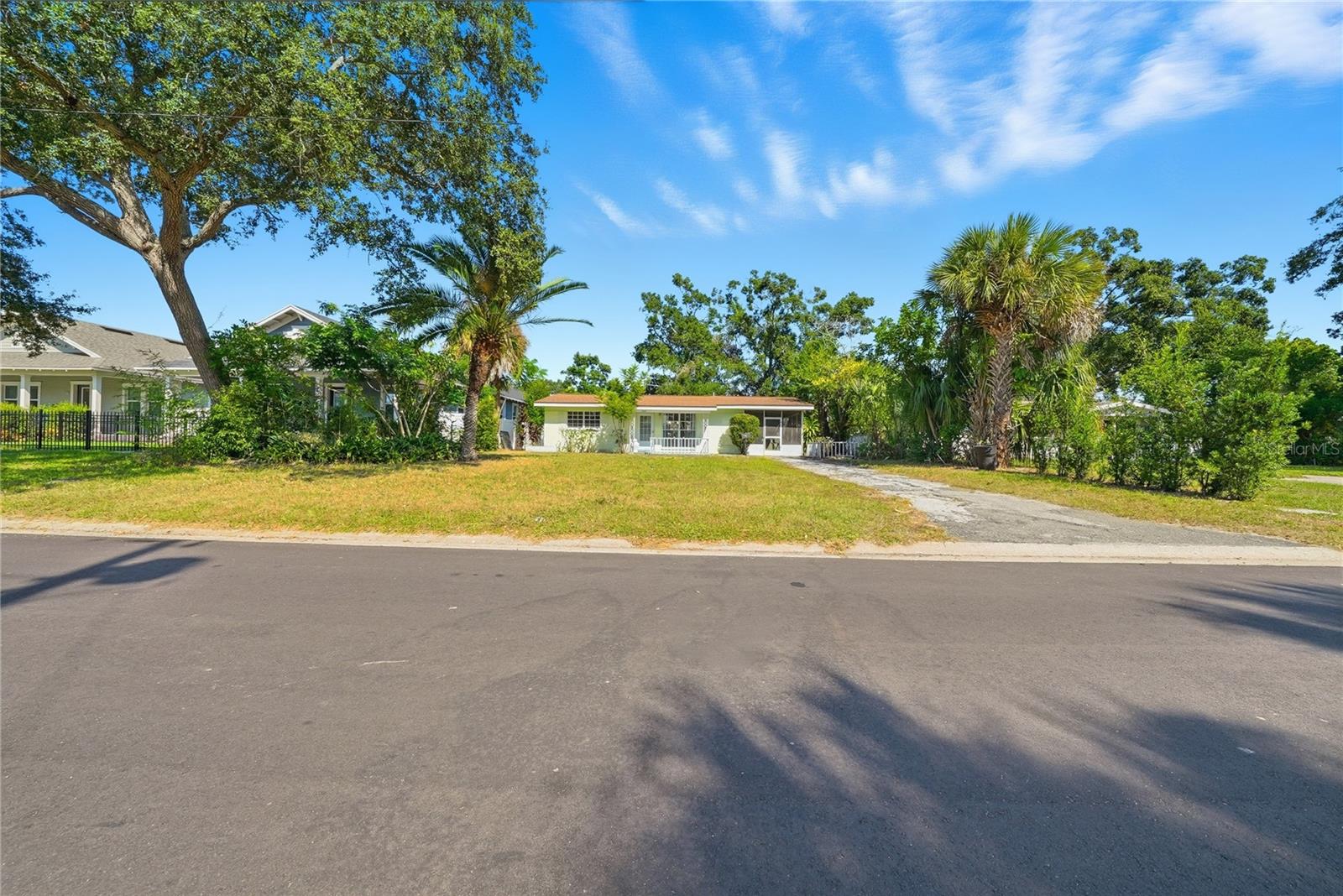 Landscaped yard & paved road