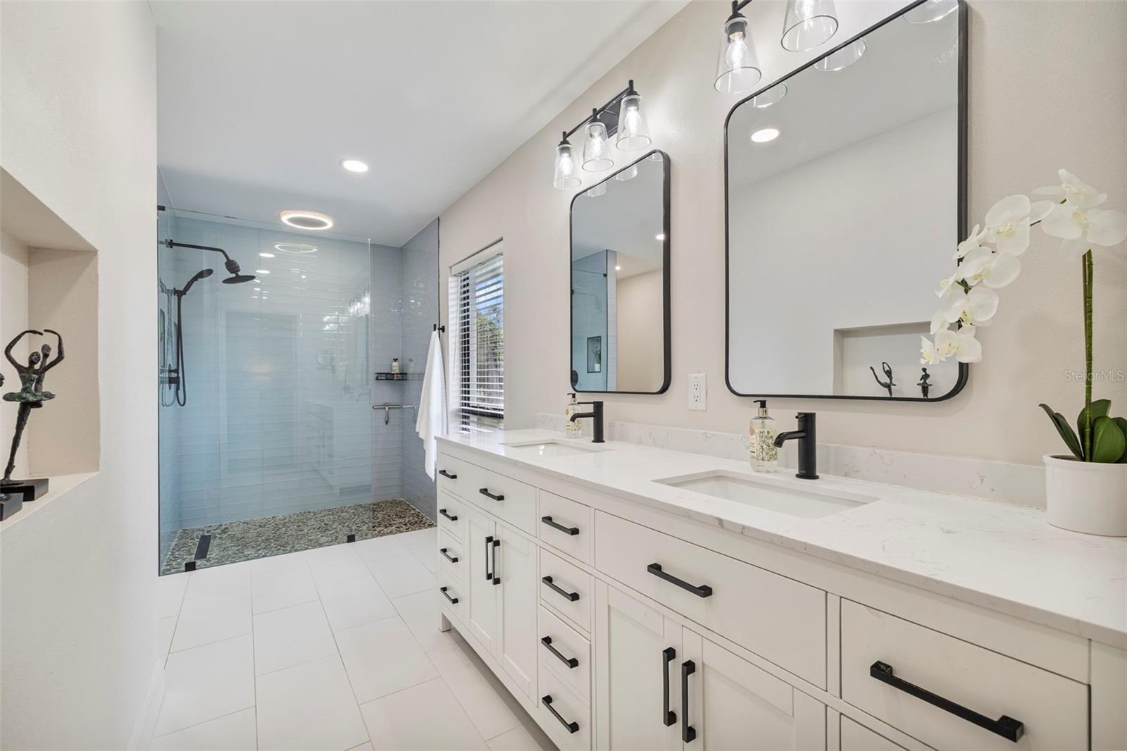 Brand new primary suite with dual vanity.