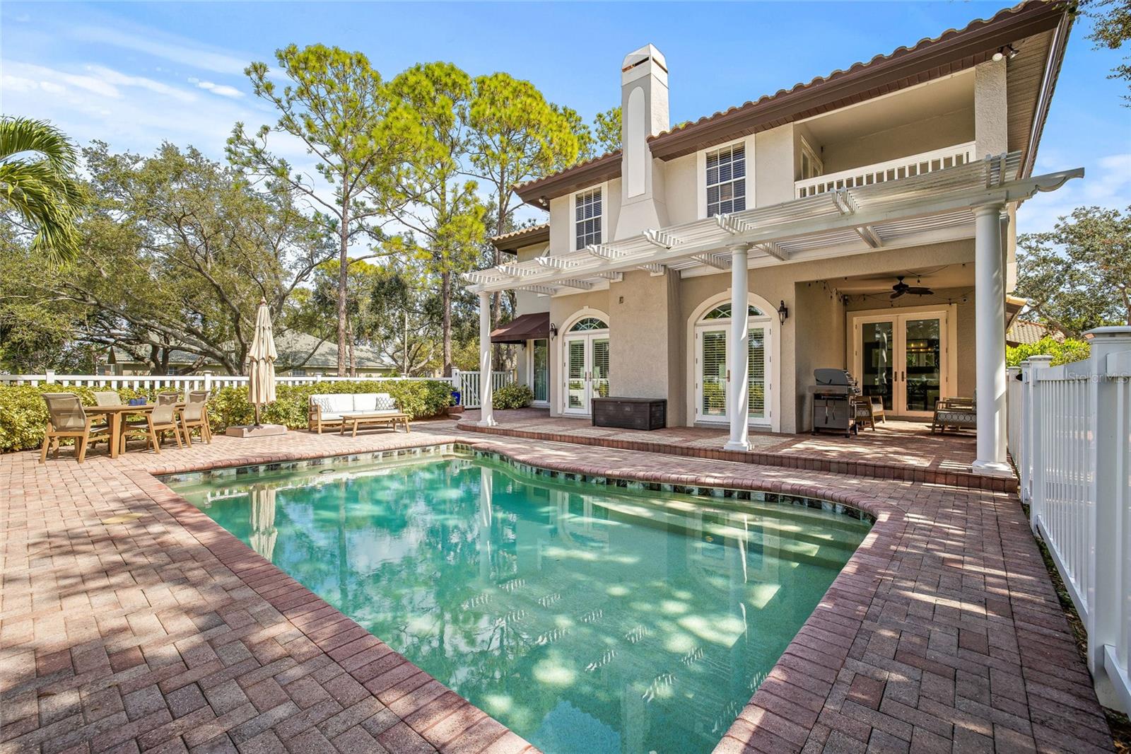 Artisan pavers surround the heated and chilled pool.