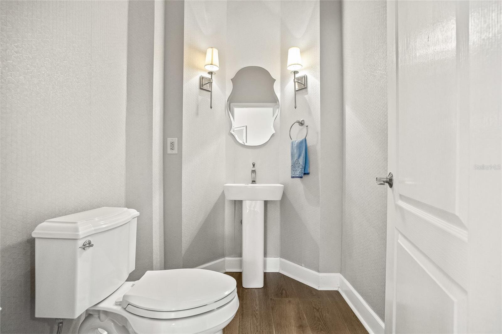 Half bathroom located downstairs.