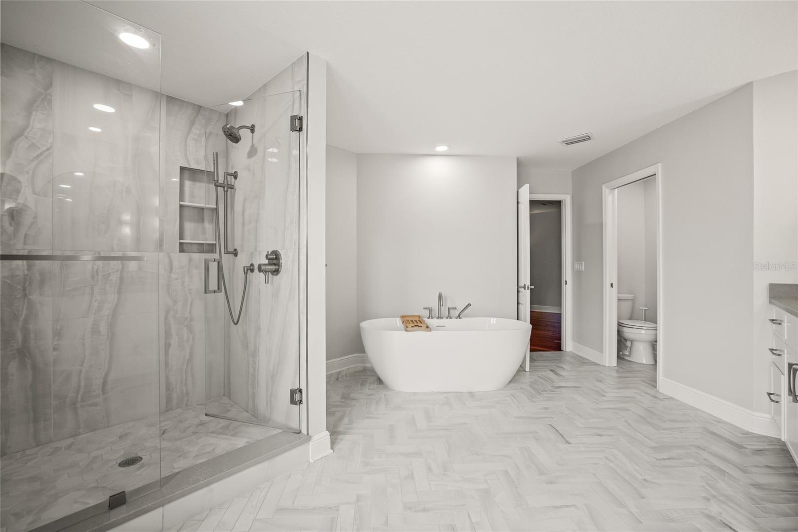 Primary En-suite- soak in the spa-like vessel tub.