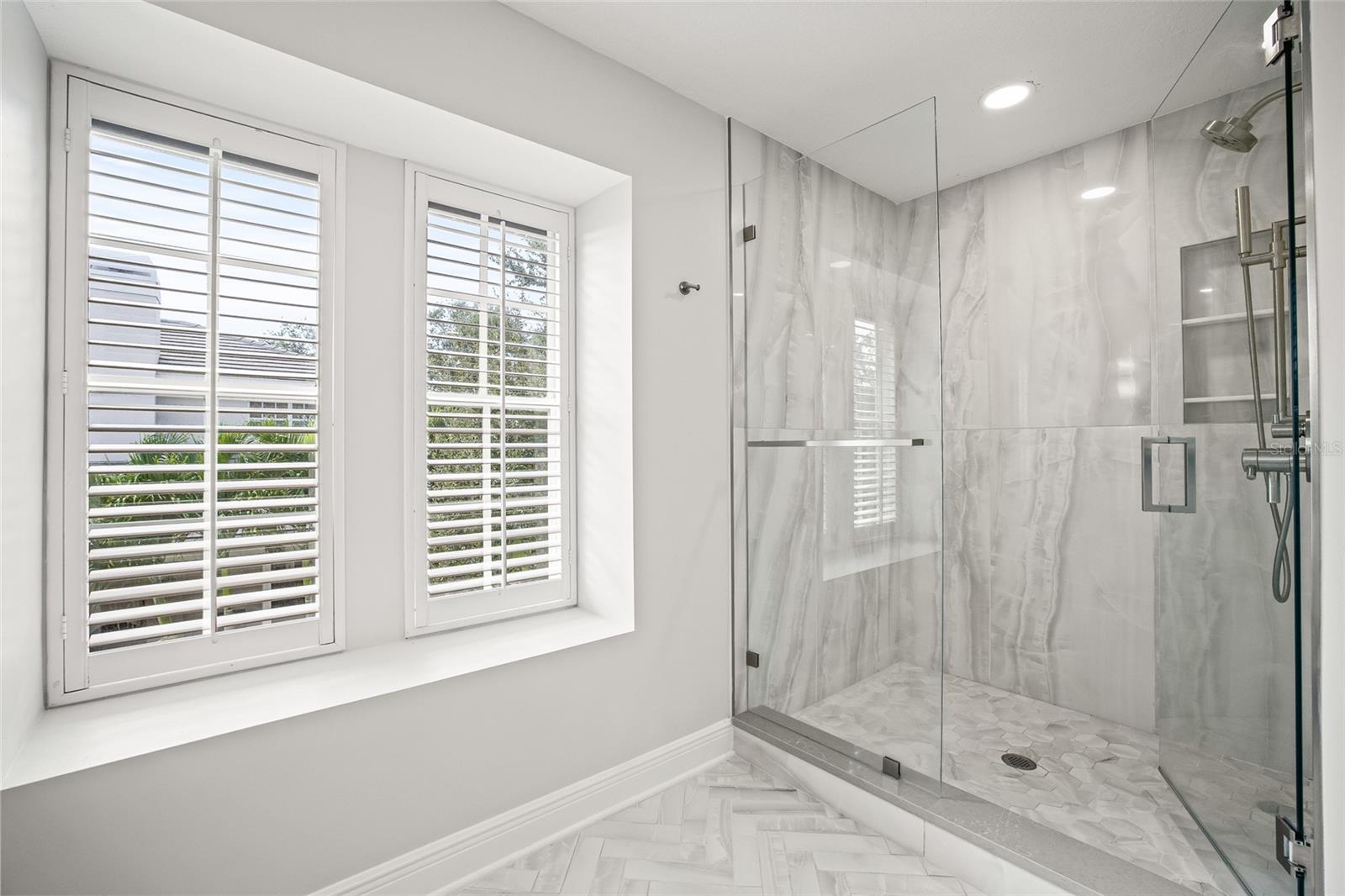 Separate walk-in shower.