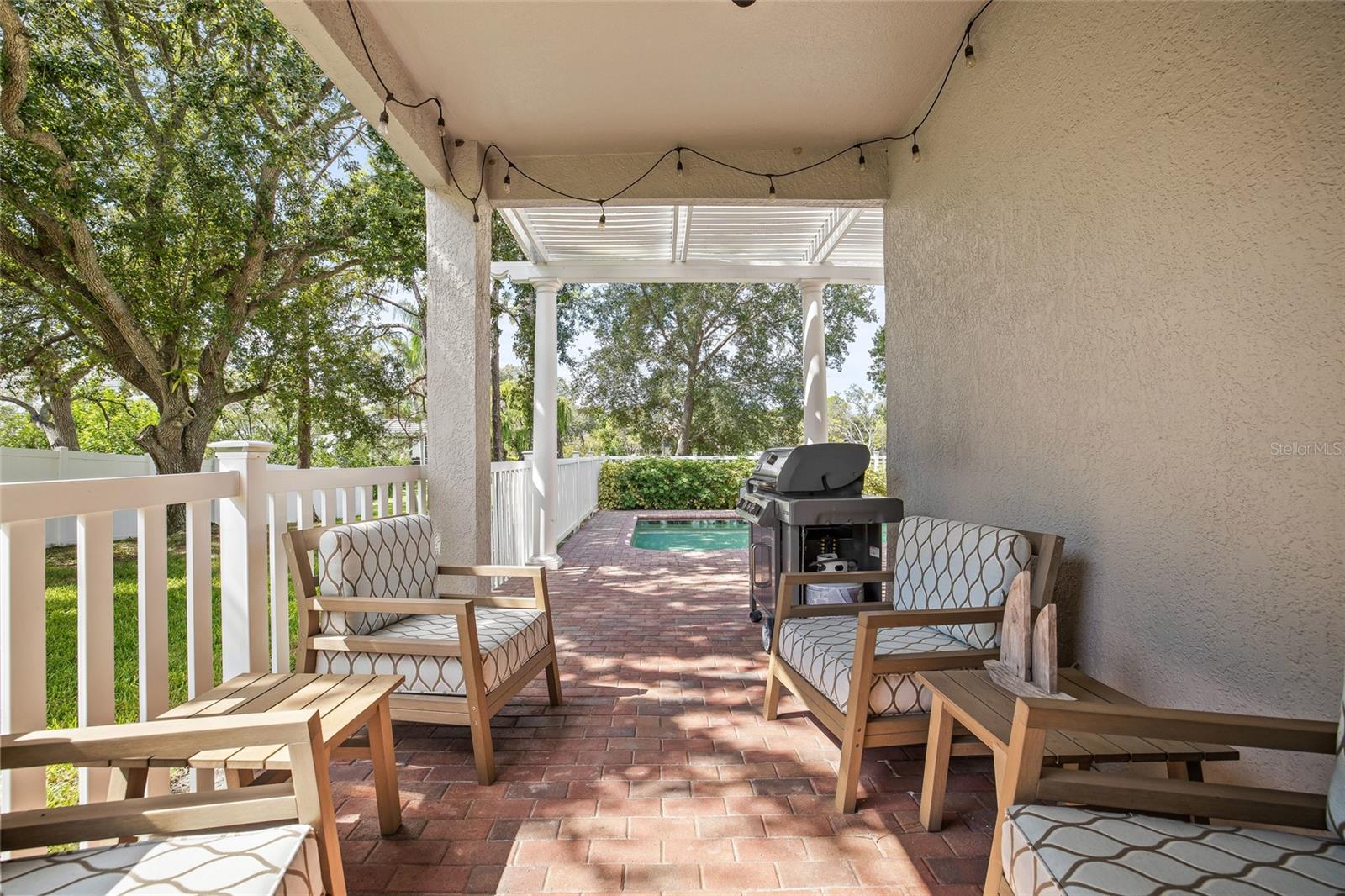 Relax outdoors under your covered patio.