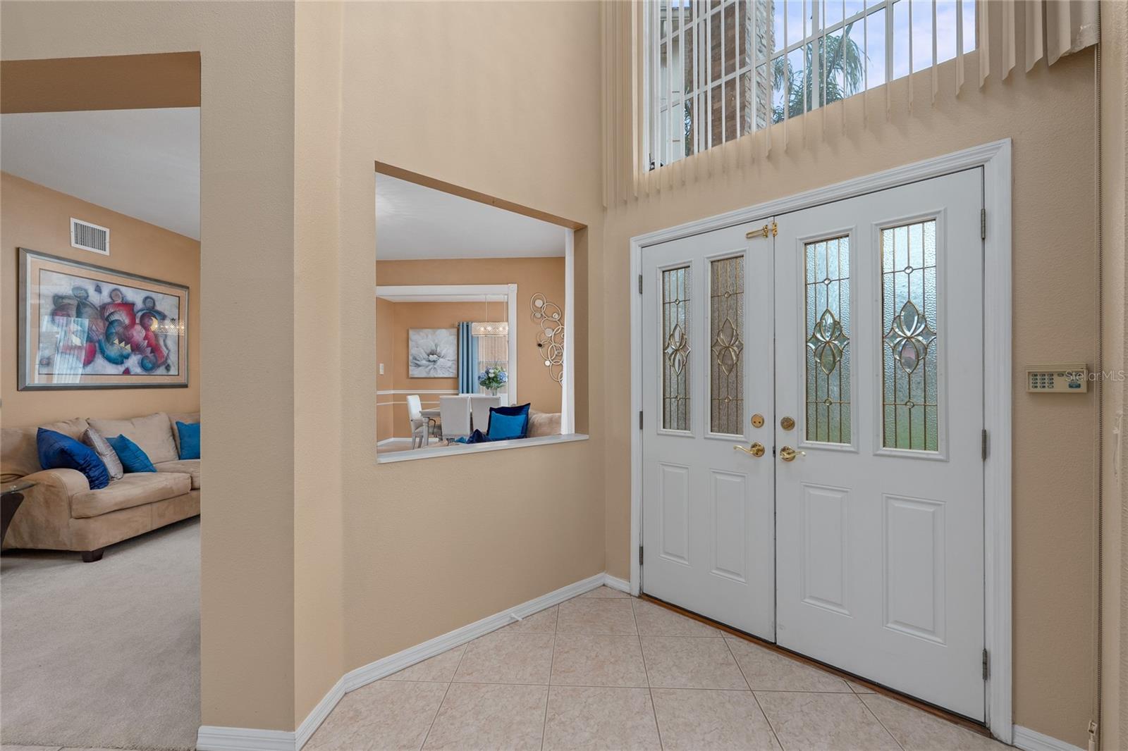 Enter the home through the double doors