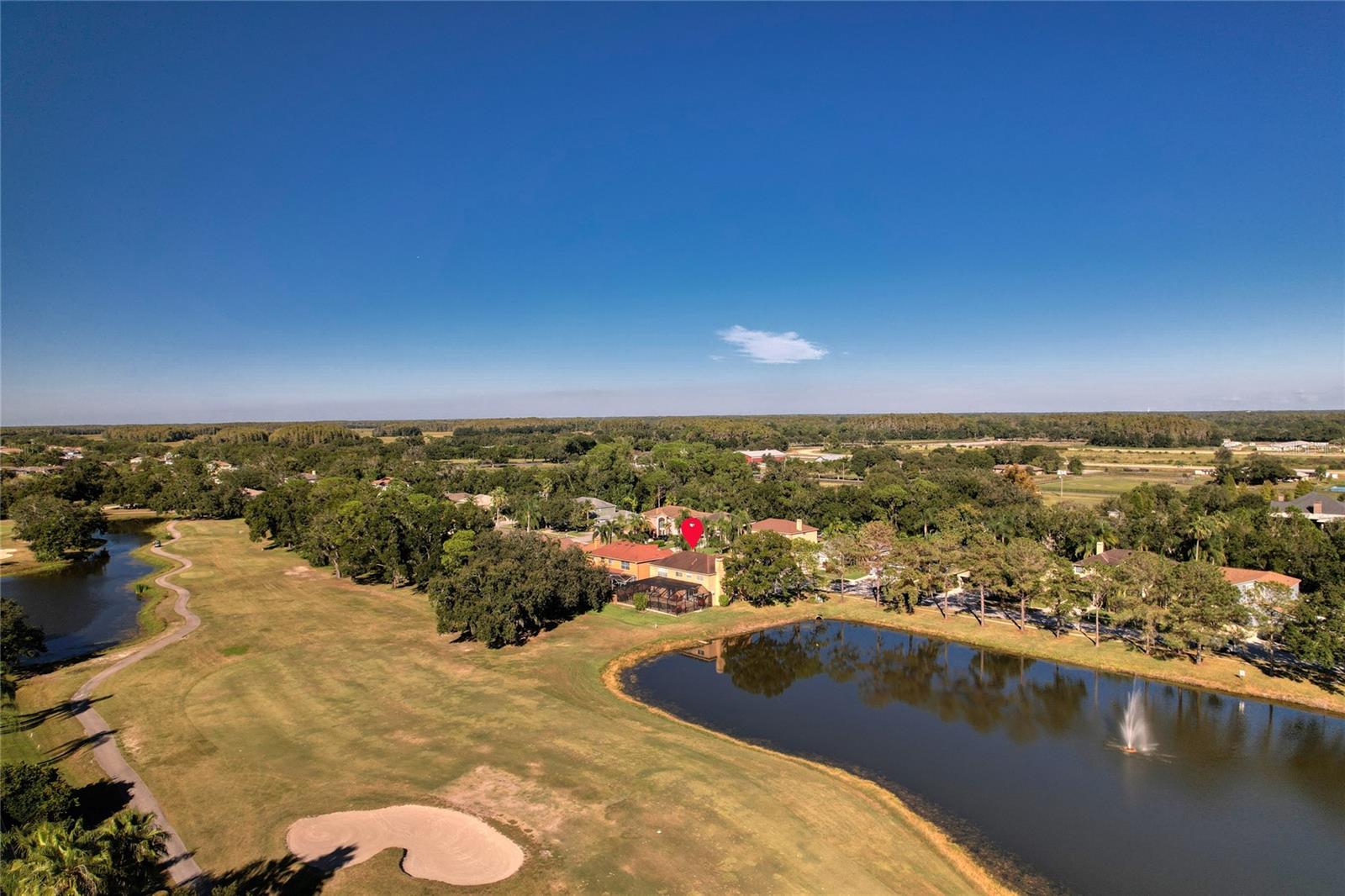 This premium lot is located on Hole 5 of The Lakes Course