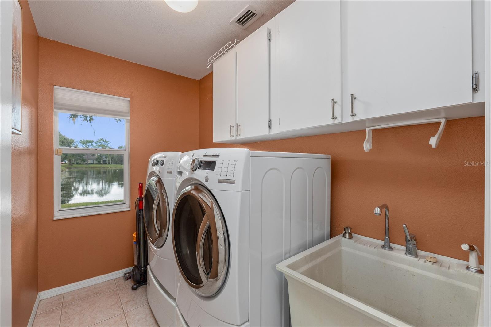 Laundry Room with storage and sink