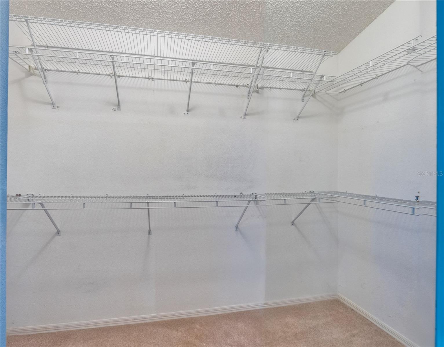 1 of 2 oversized walk in closets