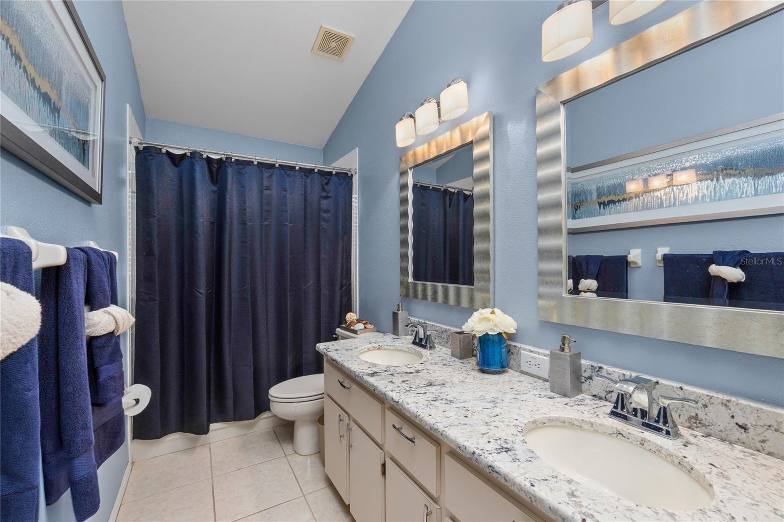 This oversized bathroom is perfectly situated between the upstairs bedrooms