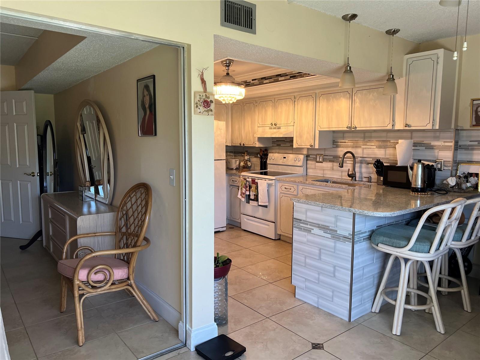 Kitchen and Primary Bedroom