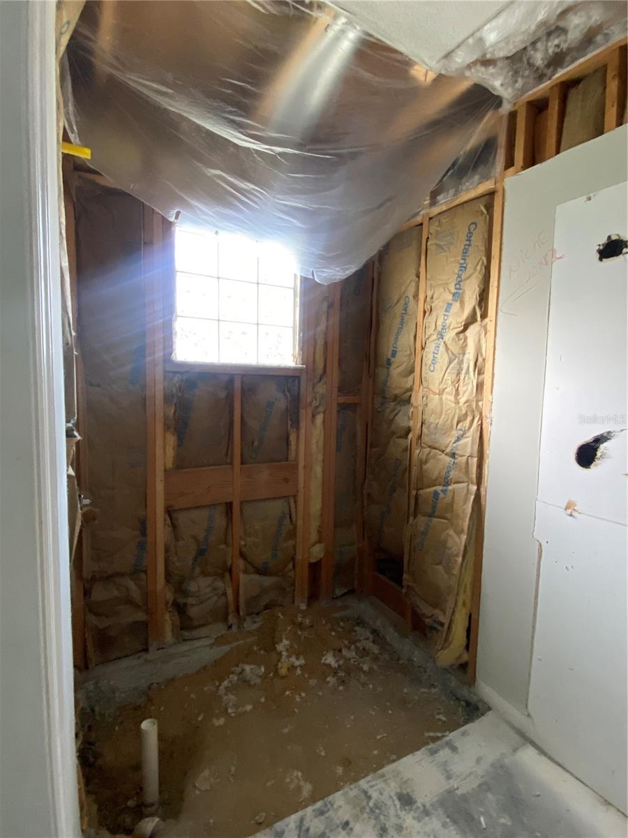 Primary Bathroom - unfinished & ready for new shower