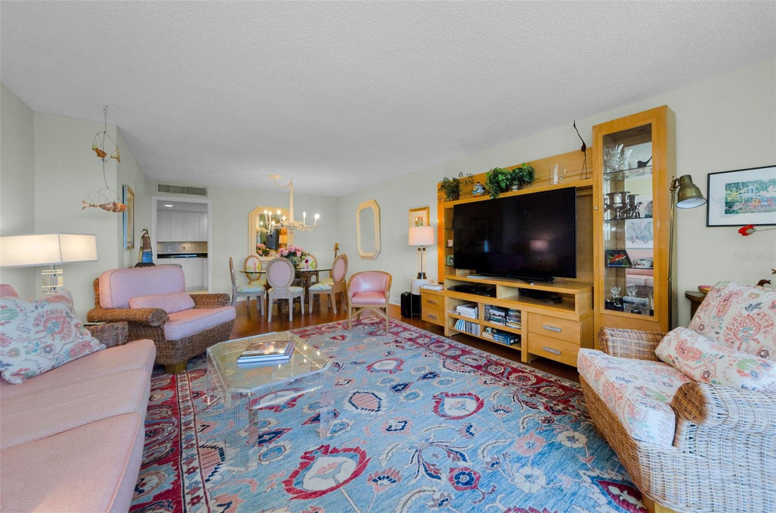 Spacious living room and dining room combination with hardwood floors.