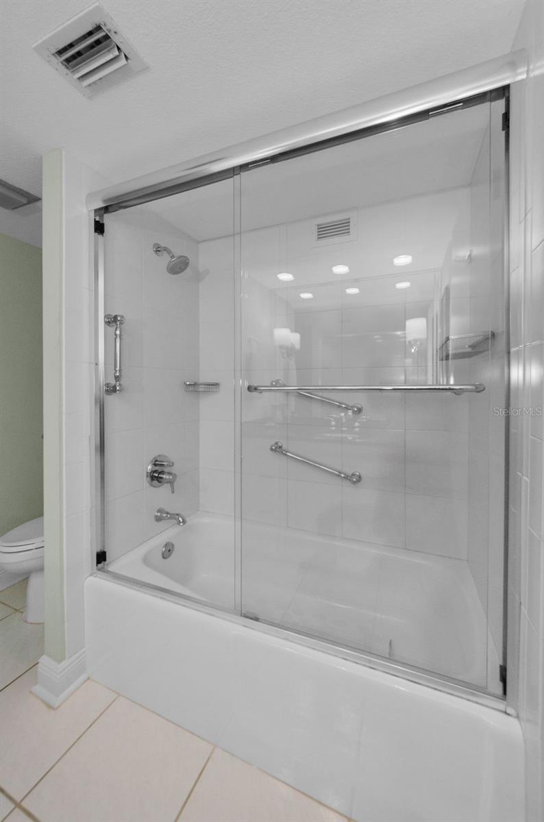 Master bath with tub/shower and new glass doors and fixtures!