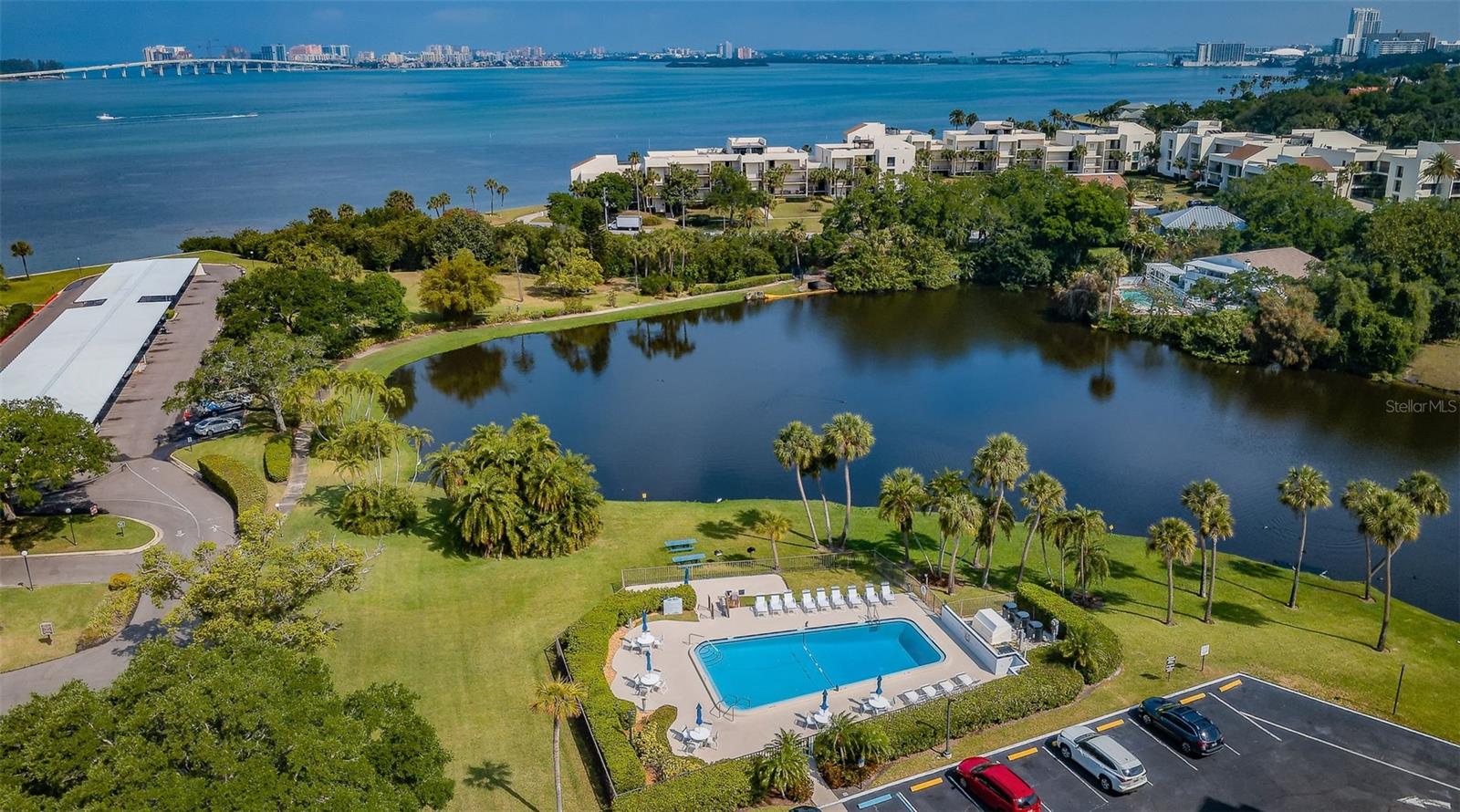 The pool for Bayshore II, next to the Lake and with so much green space!
