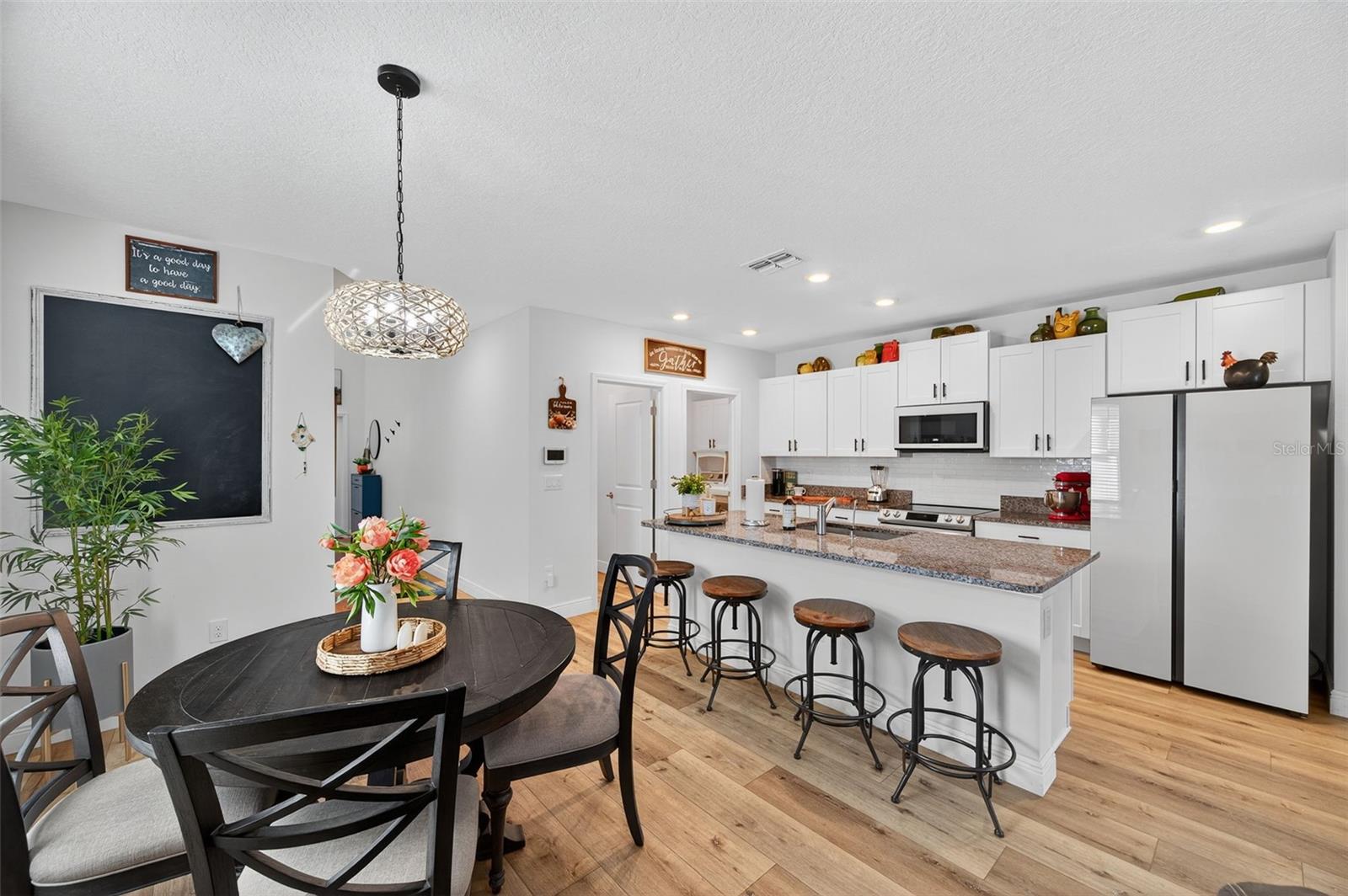 Breakfast Bar in kitchen adjacent to the dining room