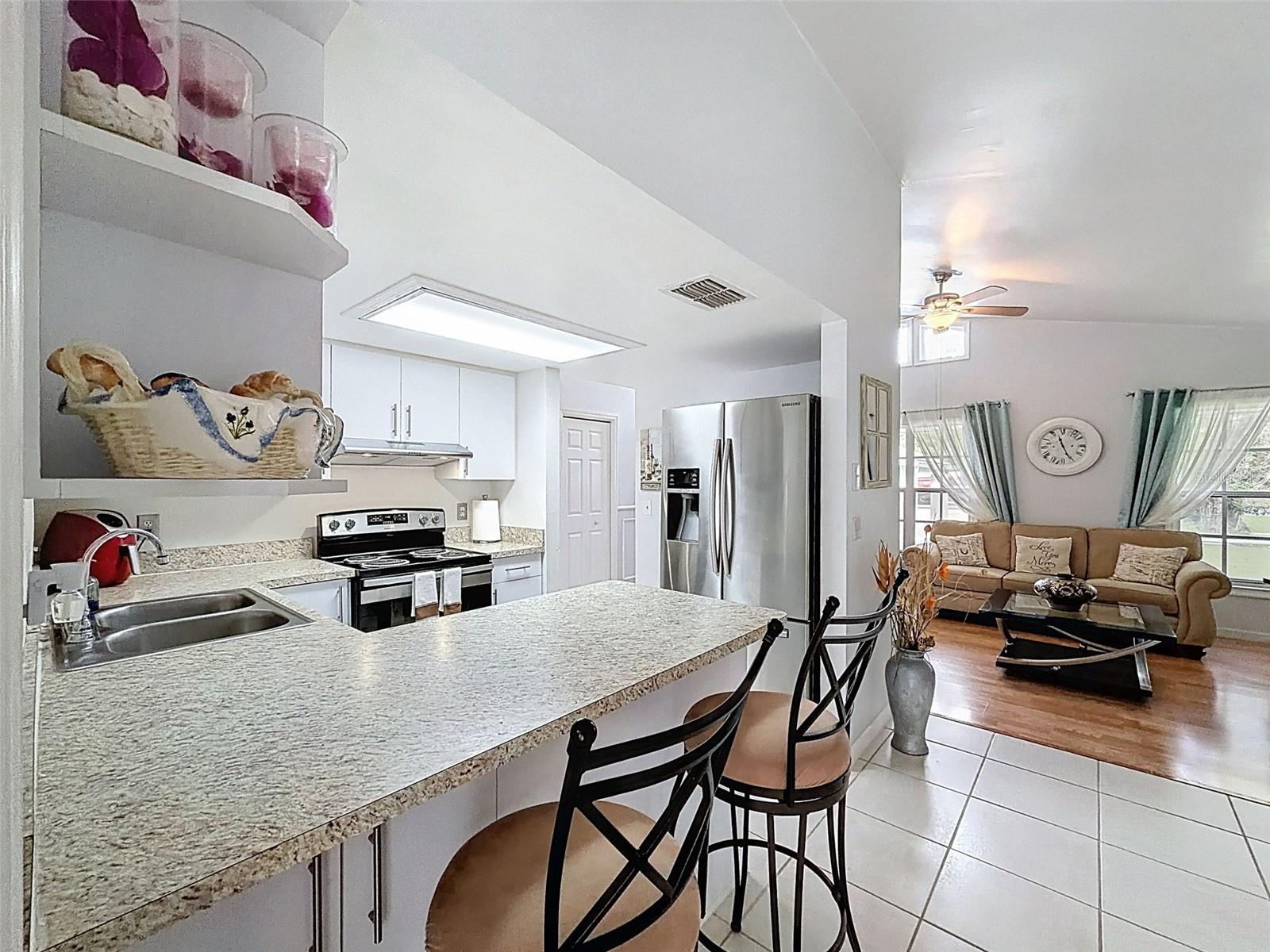 Sit with friends while cooking and entertaining.
