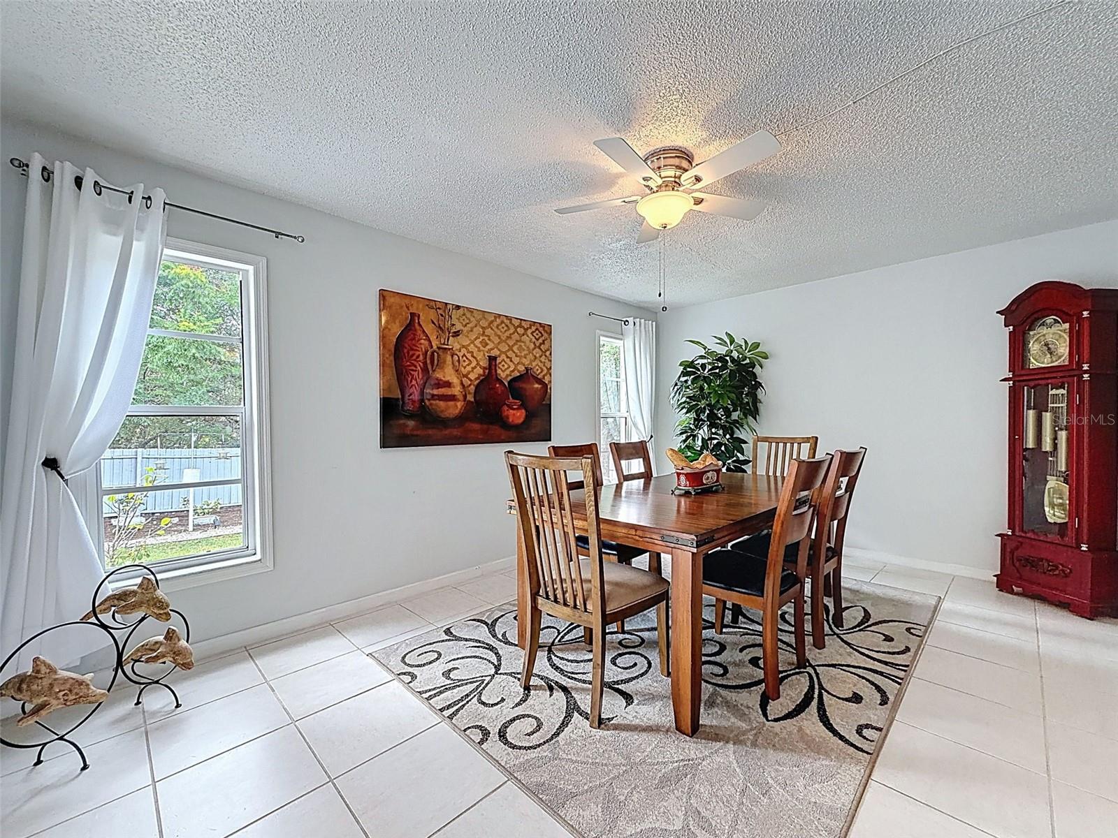 Second living or dining room space. You decide how to use it! Faces the backyard.