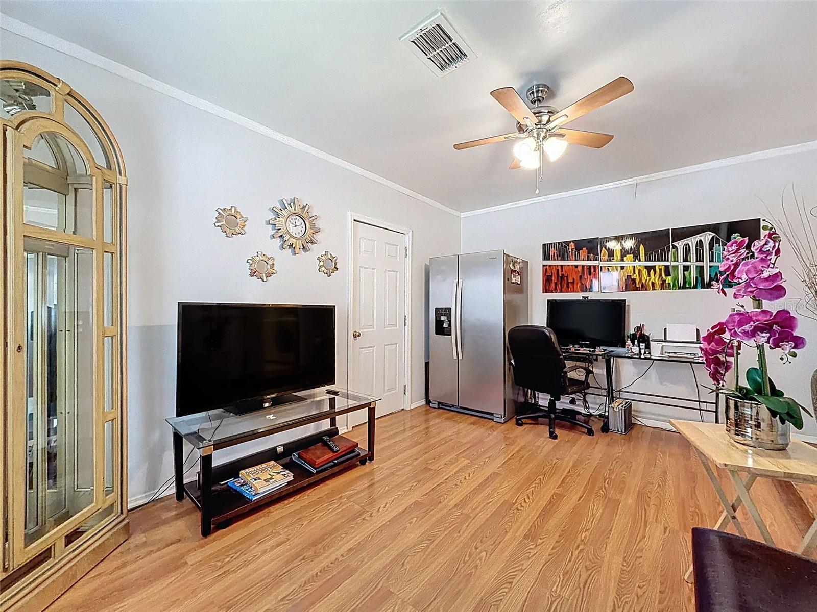 Garage partially converted into a flex room - use as an office, homework room, craft space, you decide.