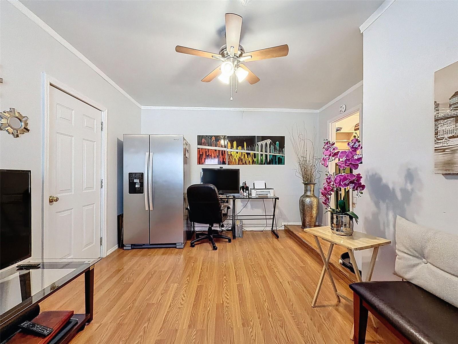 Garage partially converted into a flex room - use as an office, homework room, craft space, you decide.