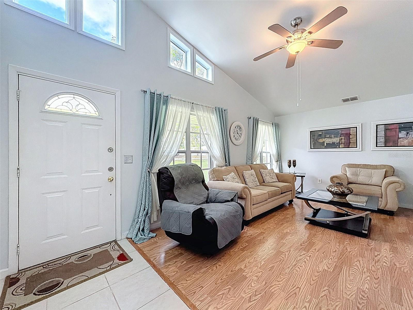 Vaulted ceilings in the living room make this room airy and light filled.