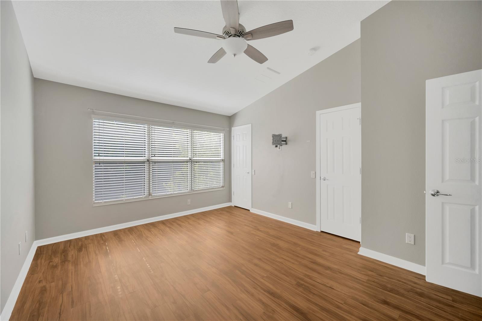 Primary Bedroom (Rear of House) with Dual Entry Closet Spanning Length of Room