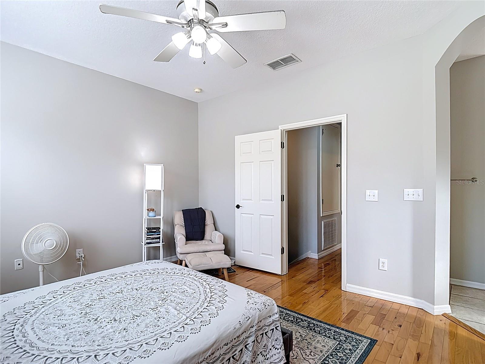 View towards hallway from primary bedroom