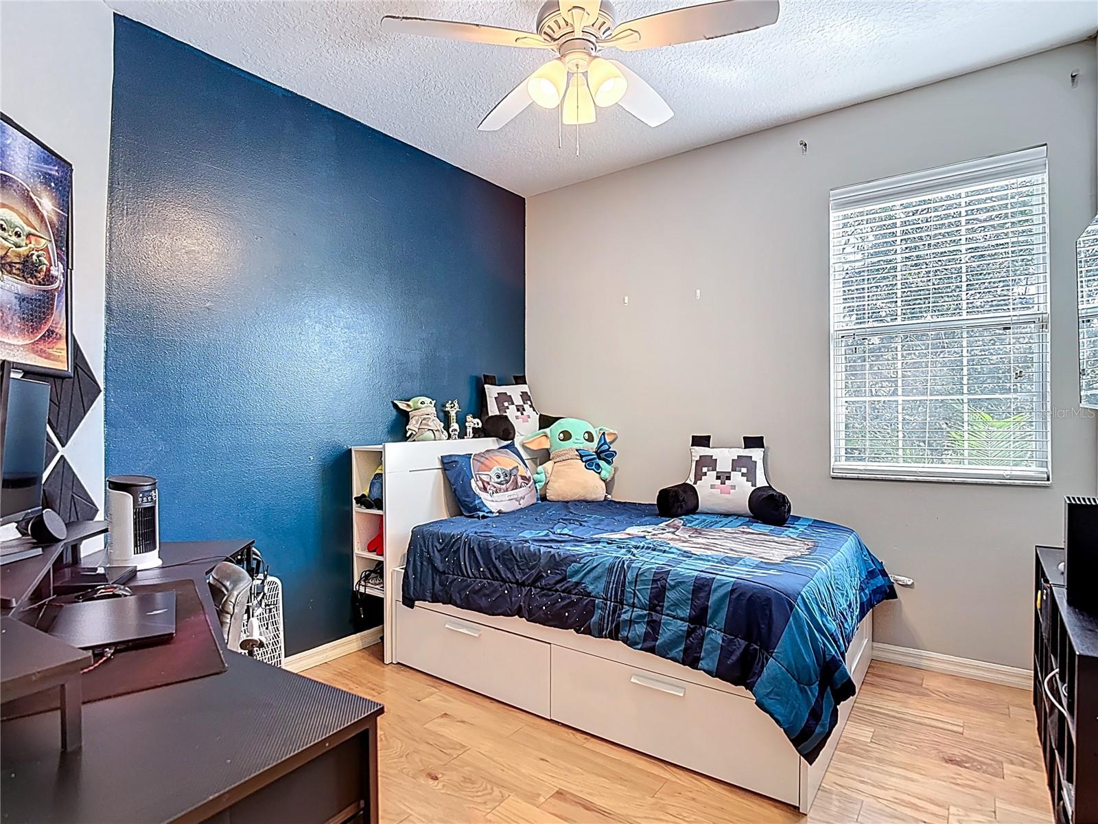 Bedroom #2 with wood flooring