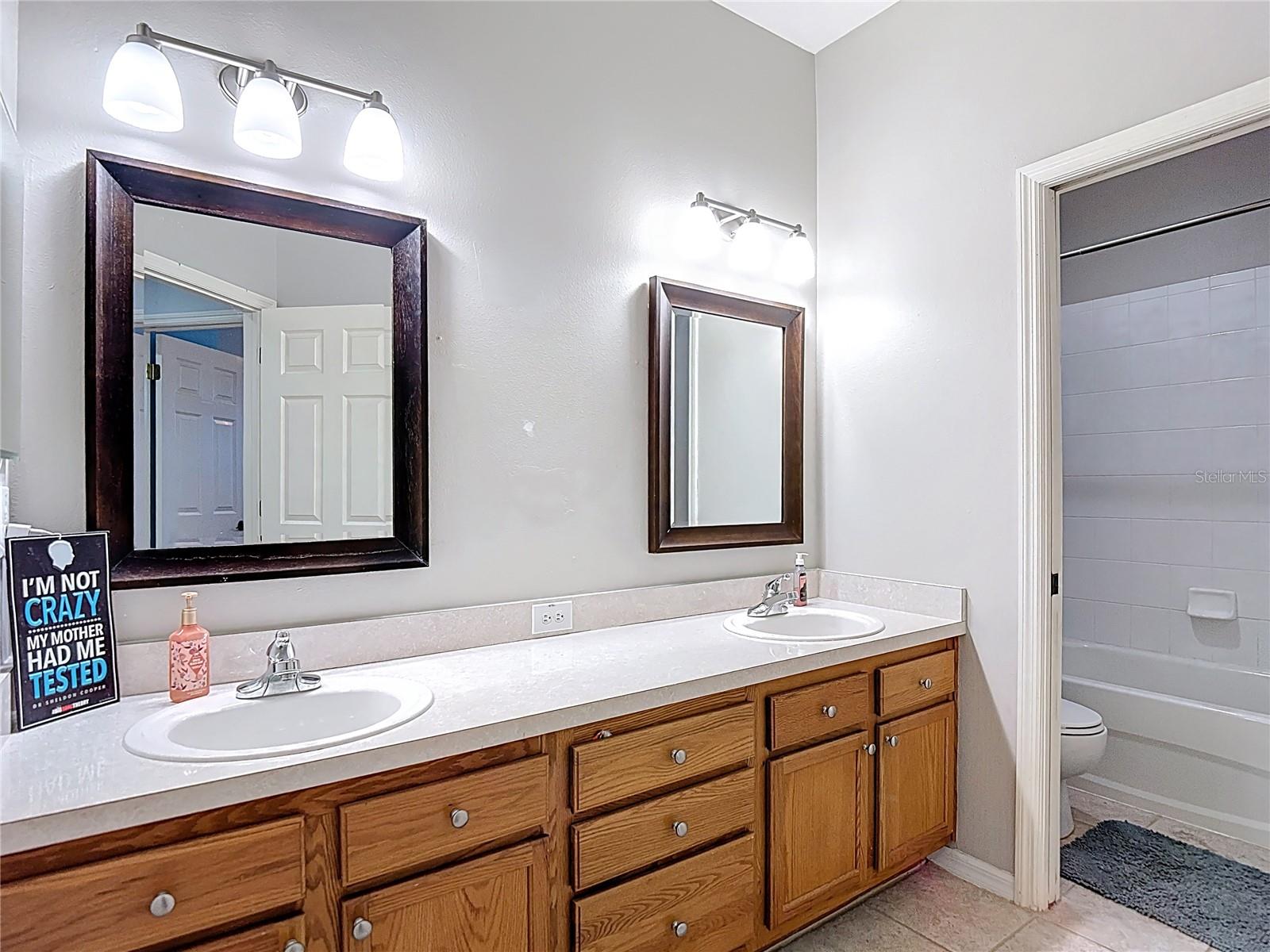 Upstairs bathroom with dual vanities