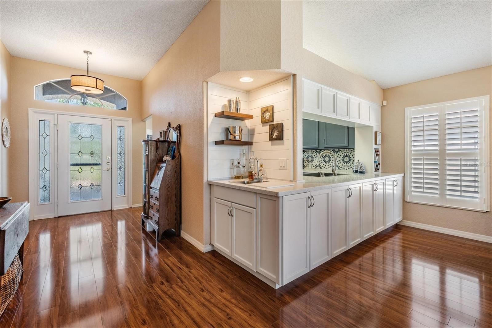 Custom wet bar with extra cabinets