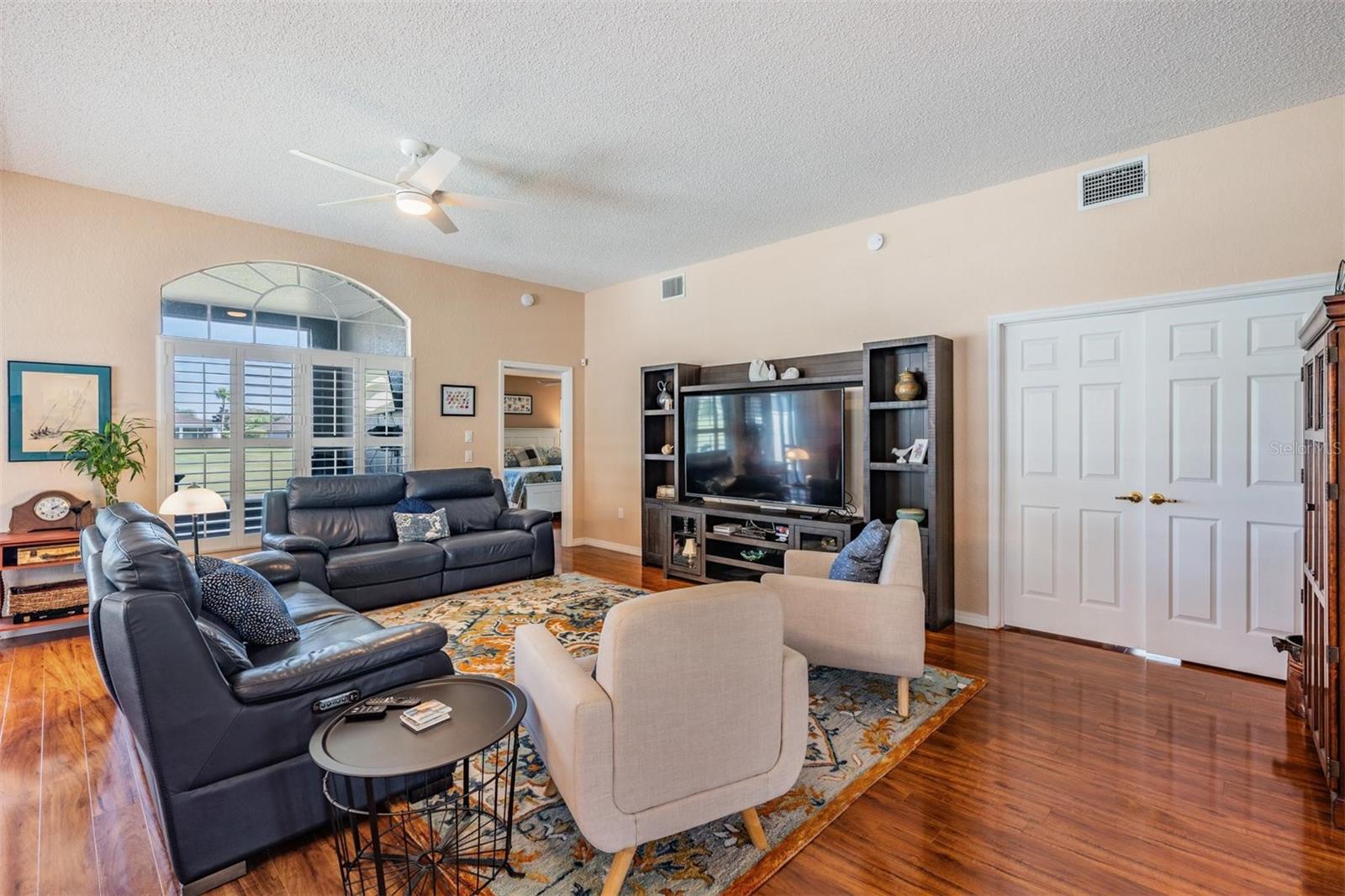 Great room with arched window details