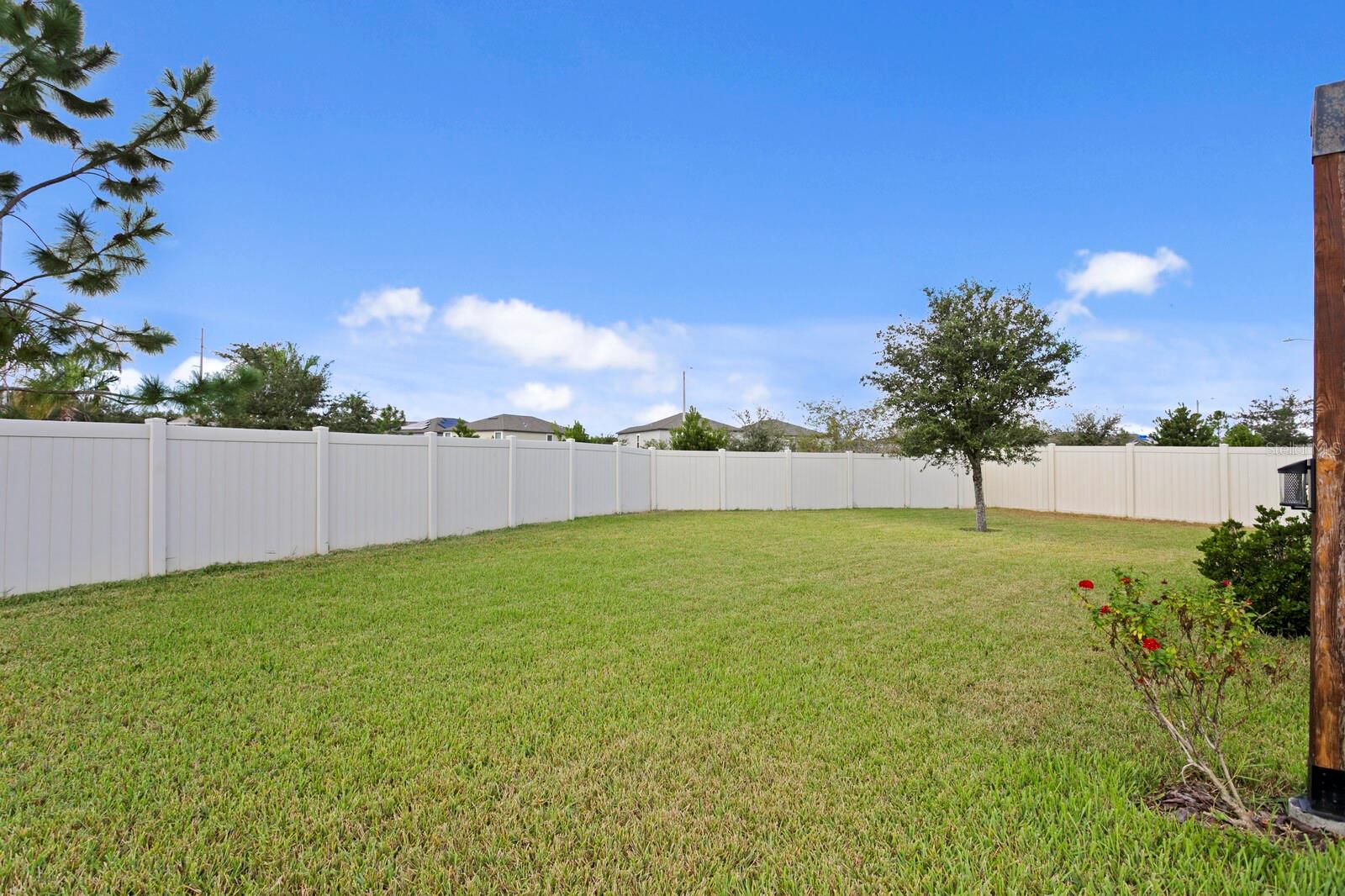 One Of The Largest Back Yards In The Community!