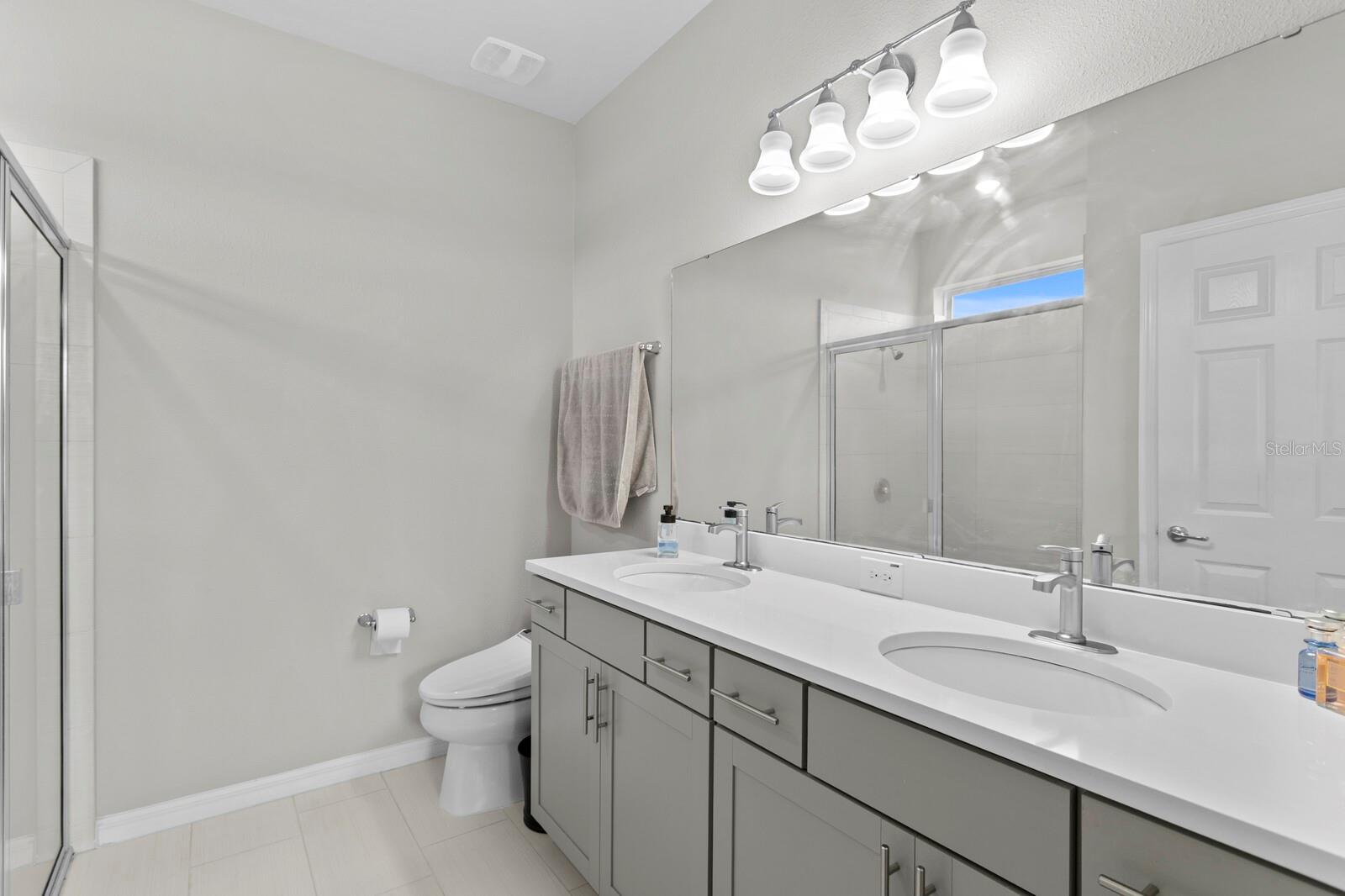 Upgraded Quartz Countertops Primary Bathroom