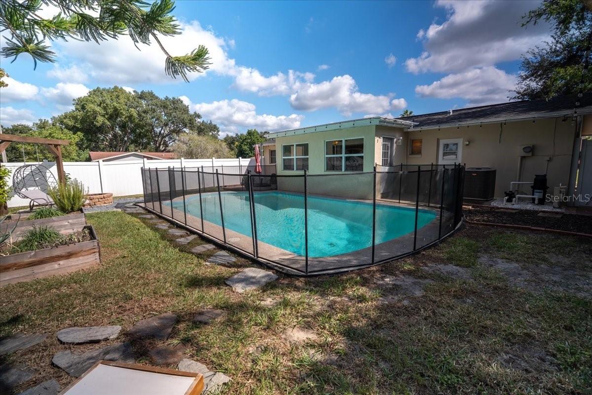 Pool view with herb or flower garden boxes