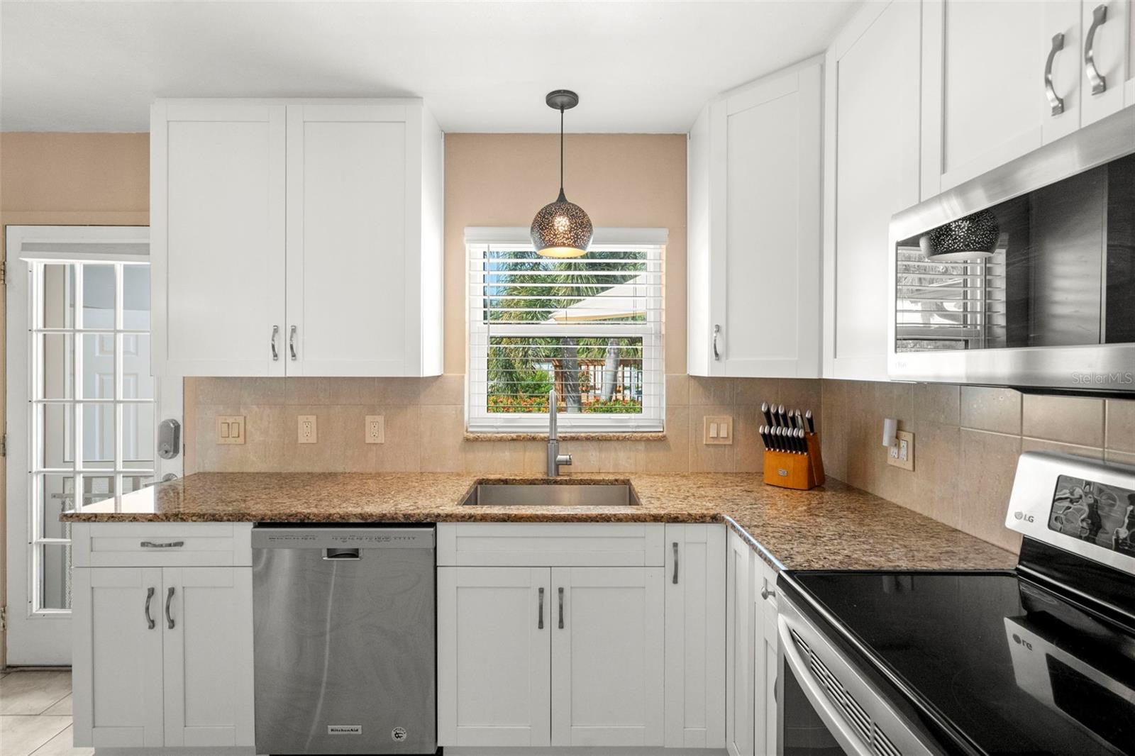 The kitchen overlooks the amazing backyard!