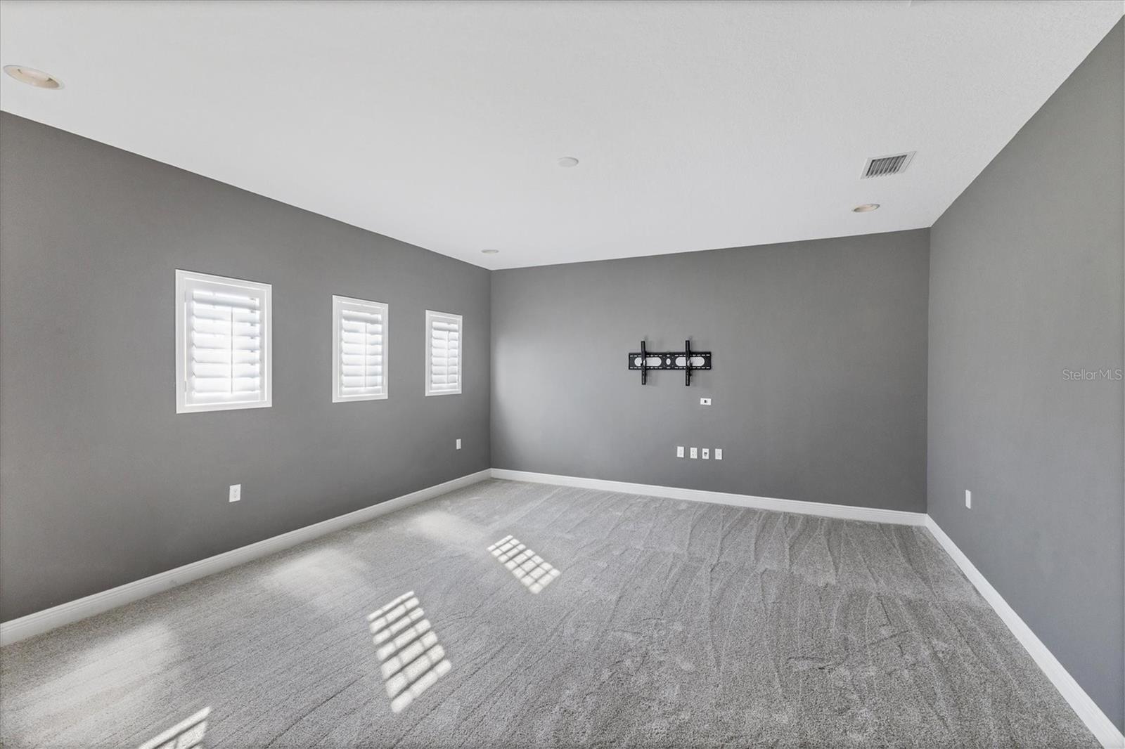 The roomy Bonus area could make a great theater, playroom & more!