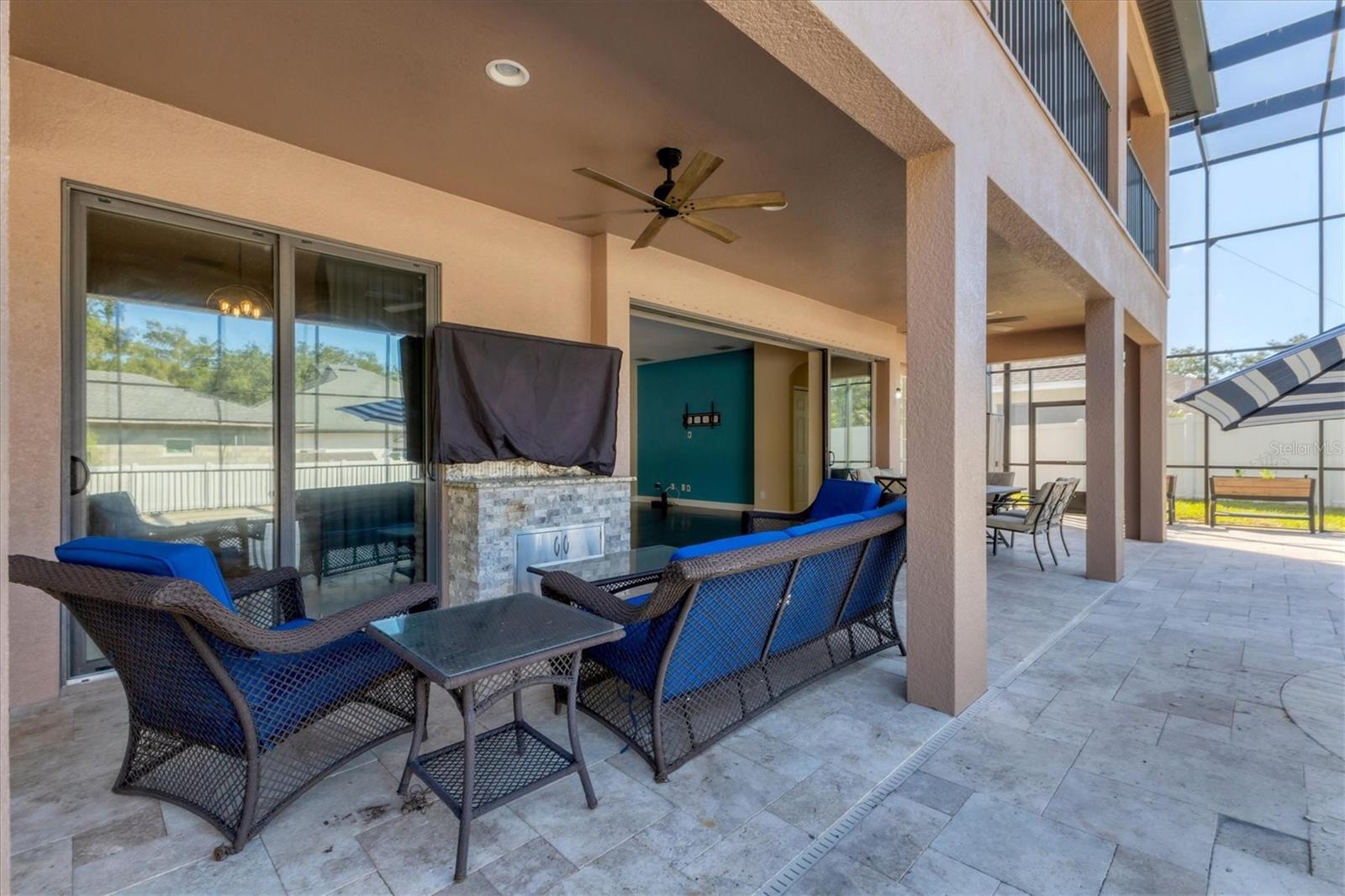 Outdoor living space off the kitchen/family rooms.