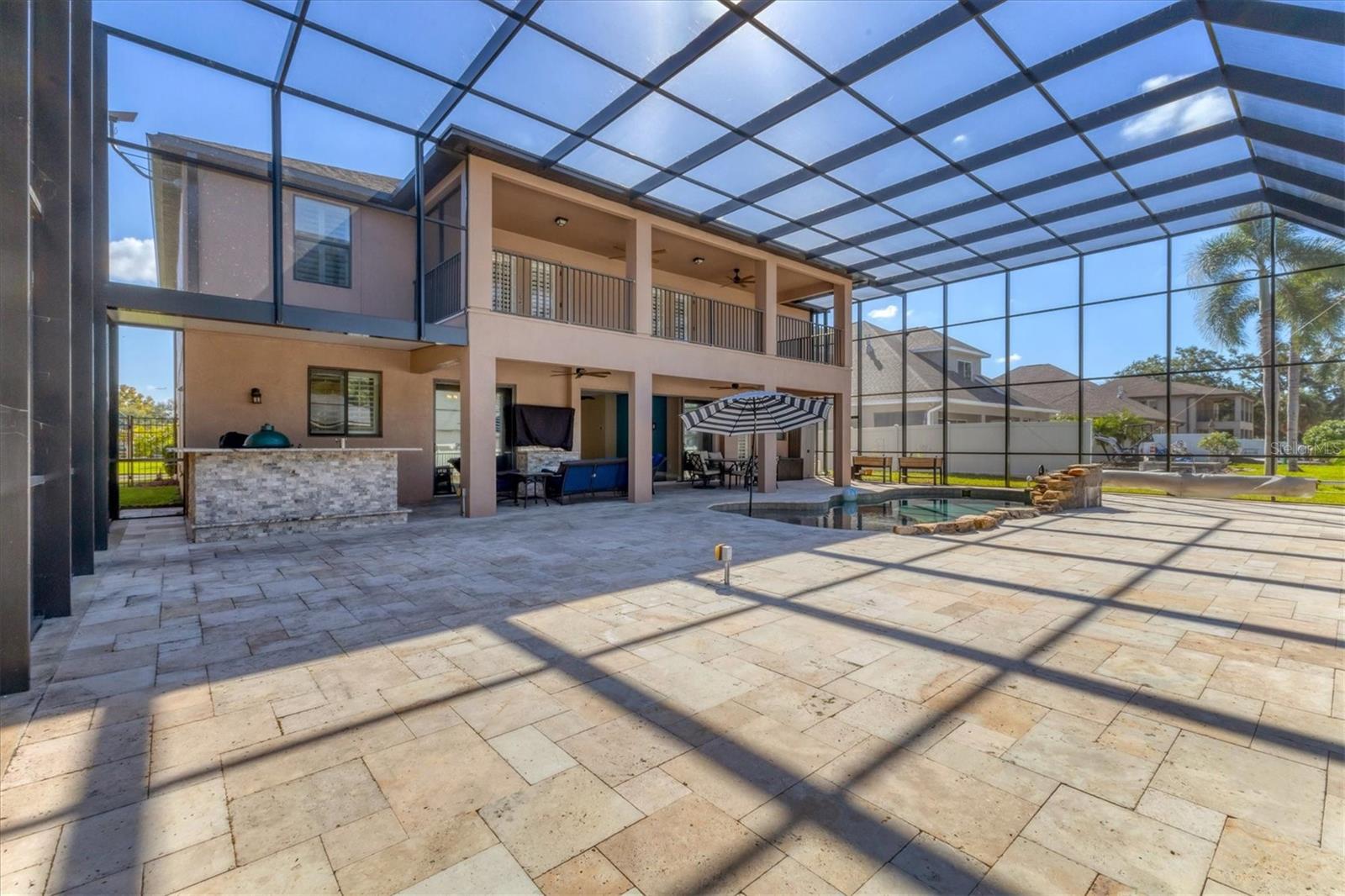Look at all that space for games, chaise lounges, colorful Adirondack chairs & more!