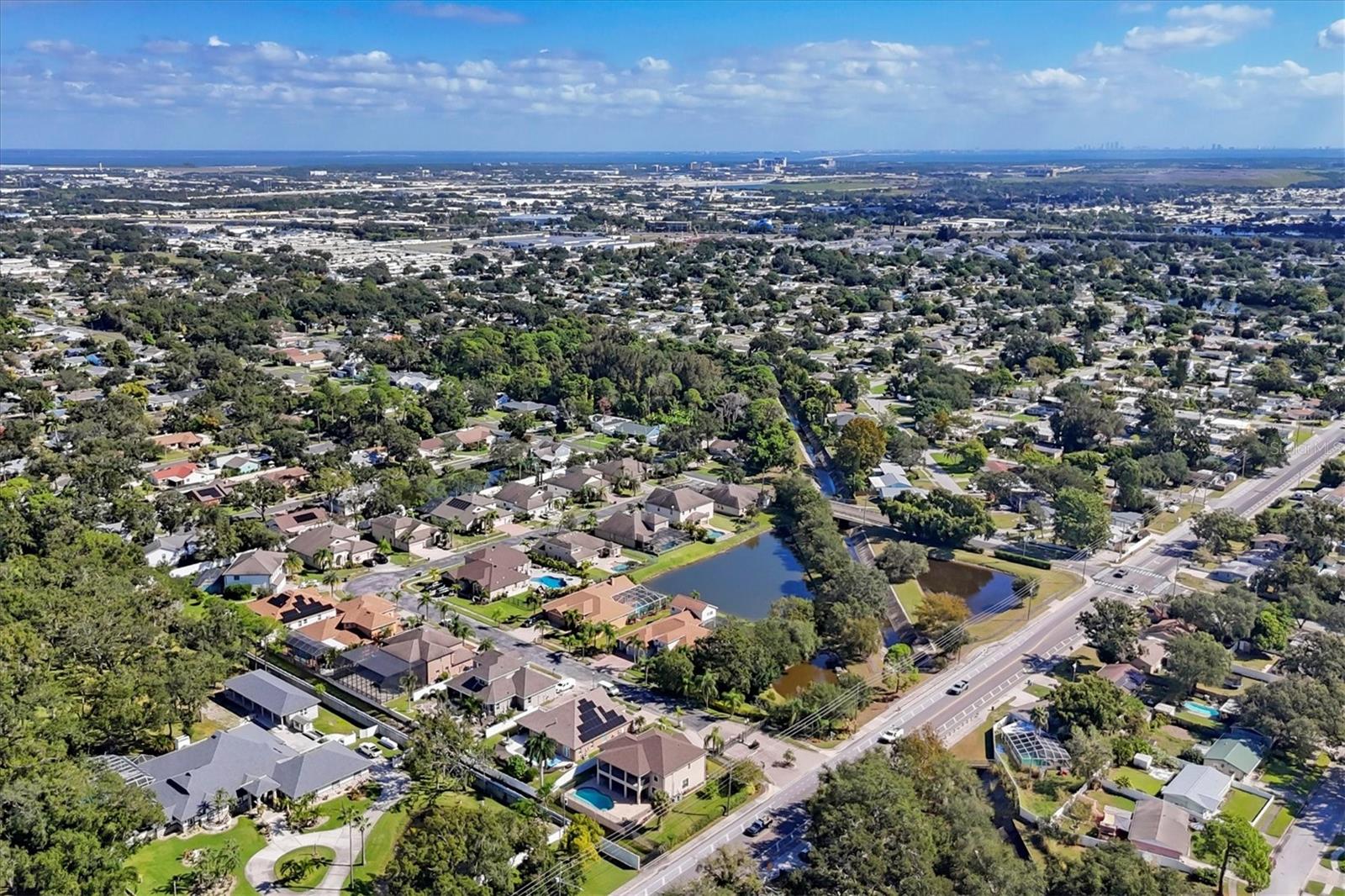 Heritage Reserve is a small, gated community with an L shaped street wrapping partway around the pond