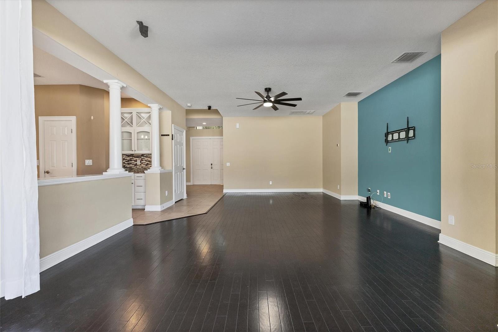 View from patio into Family Room and front door.
