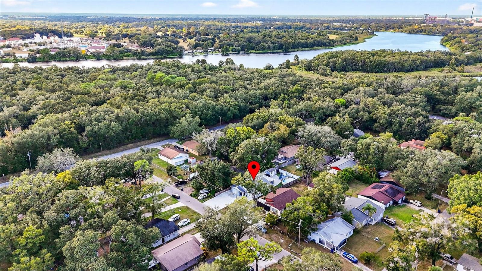 Aerial view of home & surrounding neighborhood