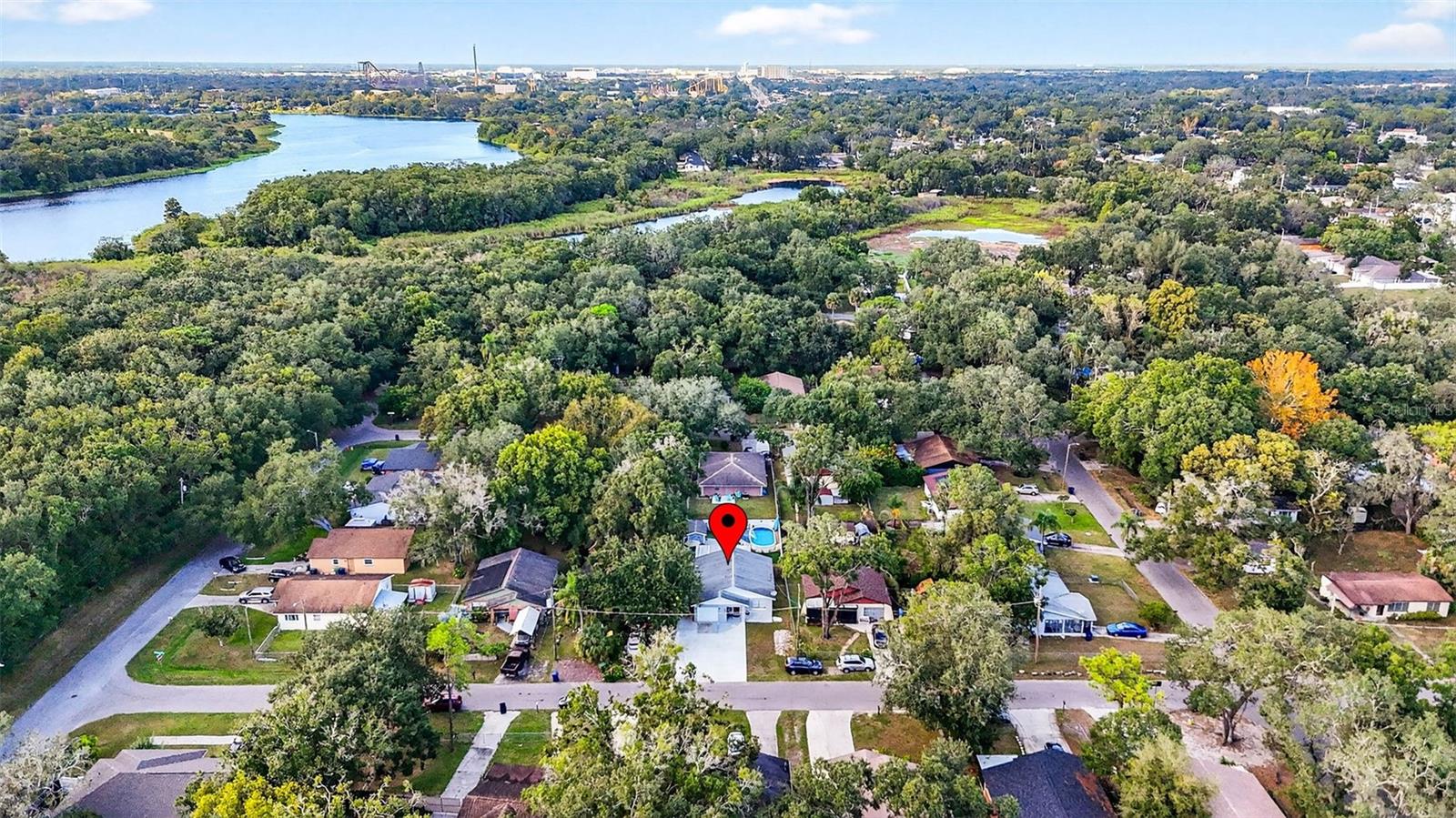 Aerial view of home & surrounding neighborhood