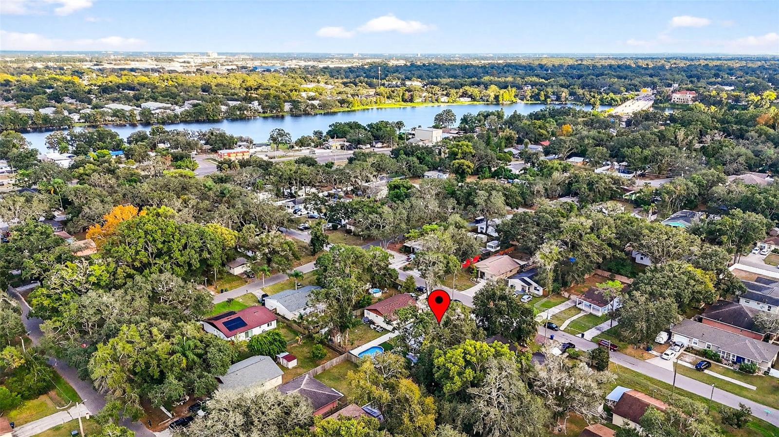 Aerial view of home & surrounding neighborhood