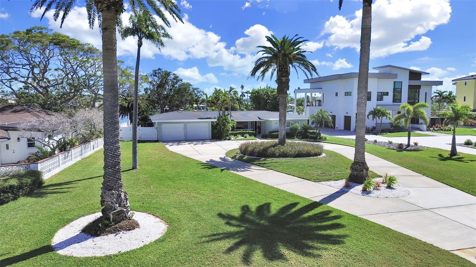 Deep .47acre lot with mature tropical landscaping