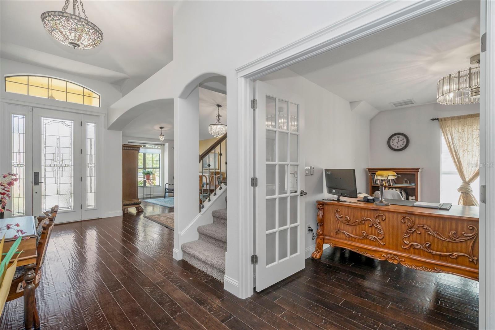Entry, stairs to loft, den/bedroom 4